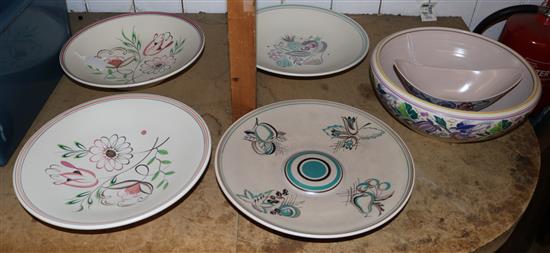 Four Poole Pottery floral-design large shallow bowls, a fruit bowl and a shaped oval bowl (6)